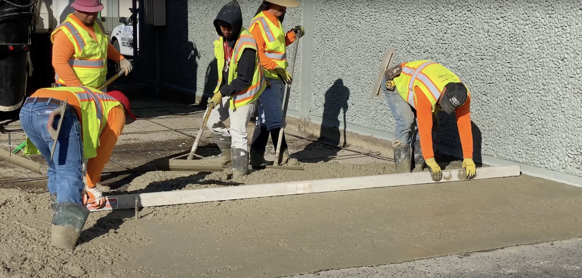 Professional concrete contractors working on sidewalk installation in Cuyahoga Falls